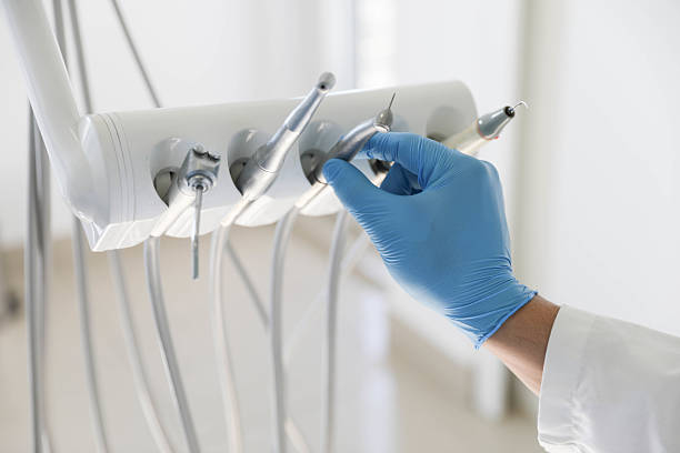 Professional Tooth Extraction technician working in Newark, AR